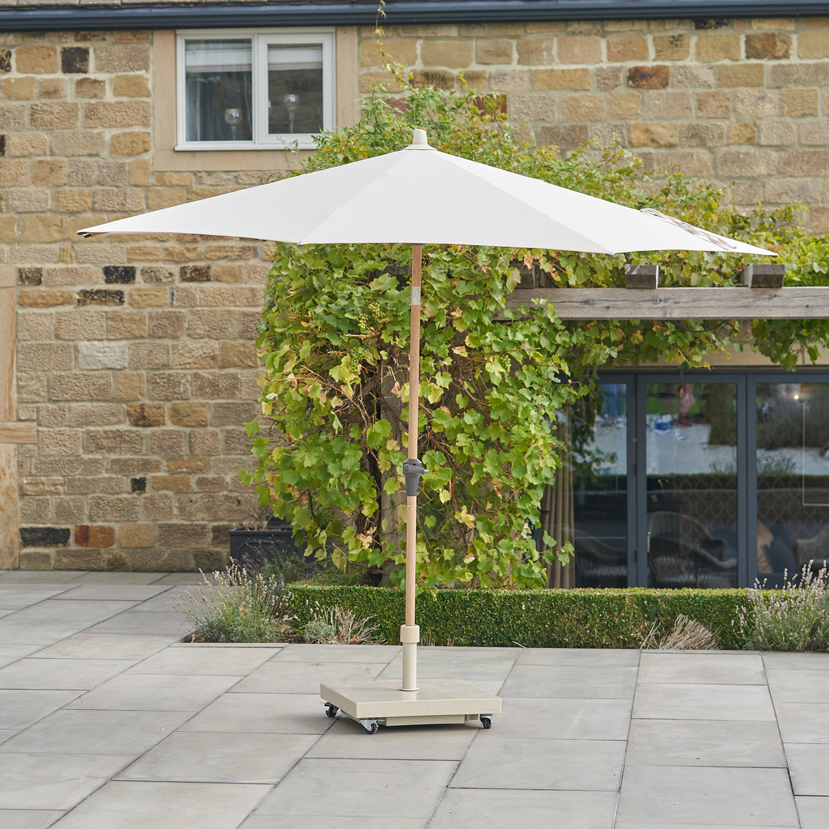 Platinum Riva 3m Round Wood Effect Crank and Tilt Champagne Garden Parasol