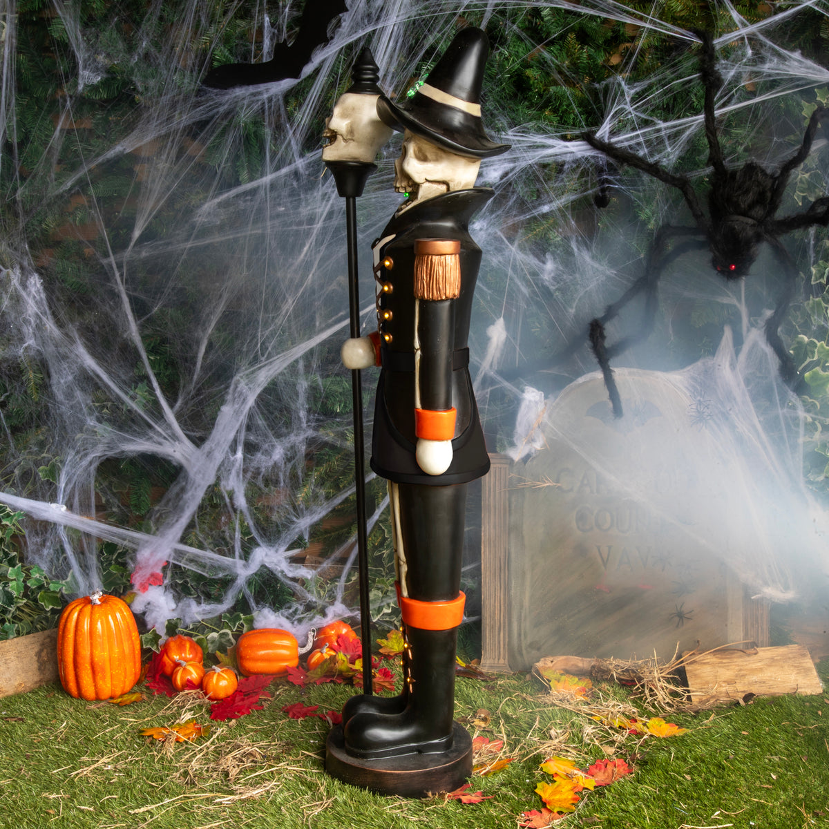 4ft Black and Orange Halloween Nutcracker Skeleton with Skull Staff and LED Lights