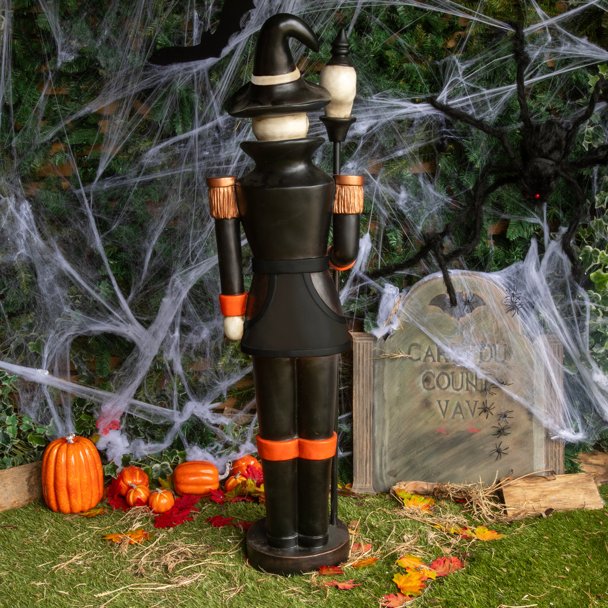 4ft Black and Orange Halloween Nutcracker Skeleton with Skull Staff and LED Lights