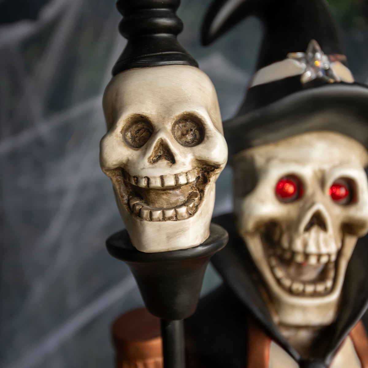 4ft Black and Orange Halloween Nutcracker Skeleton with Skull Staff and LED Lights