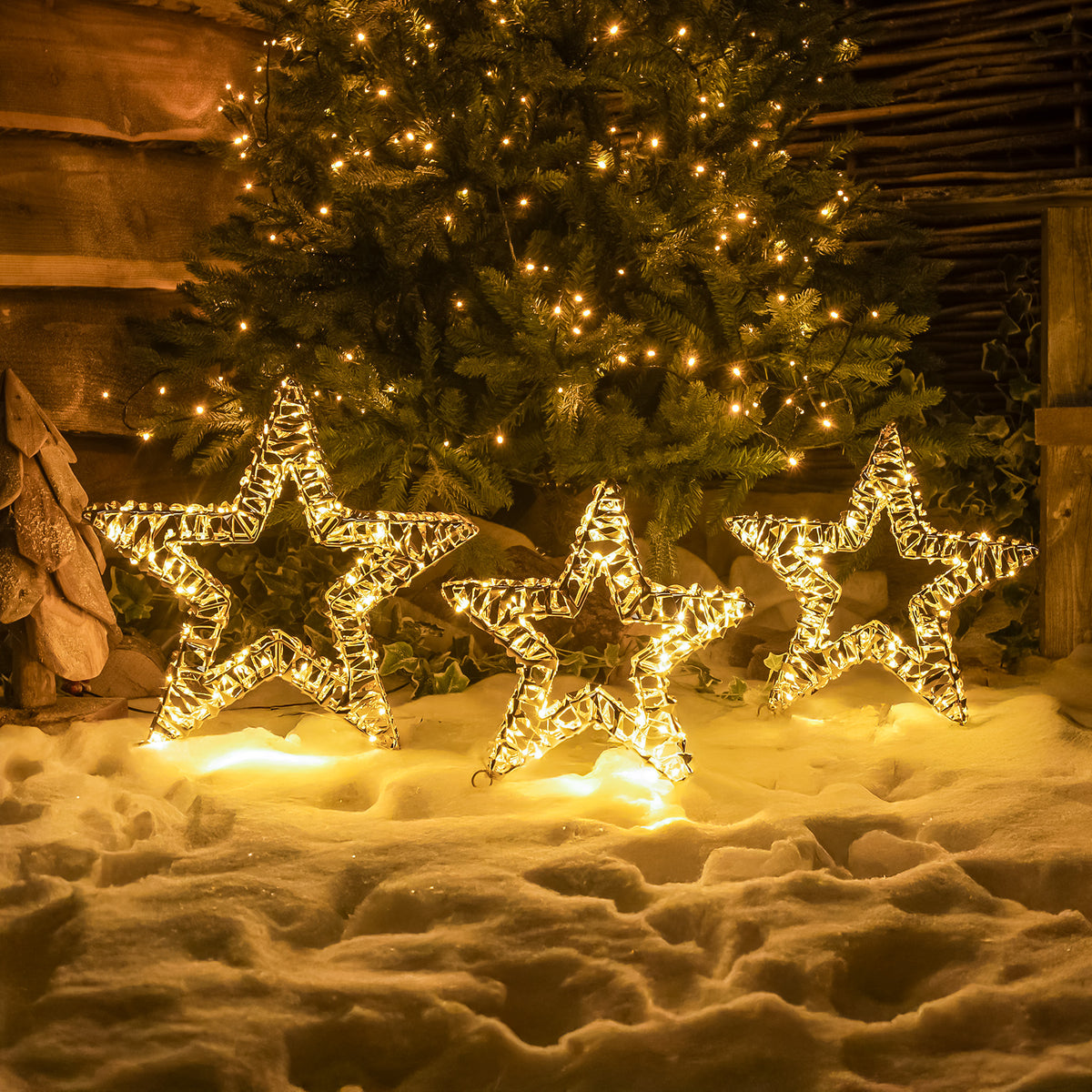 Set of 3 Pre-Lit Christmas Gold Laser Light-Up Stars with Warm White LED