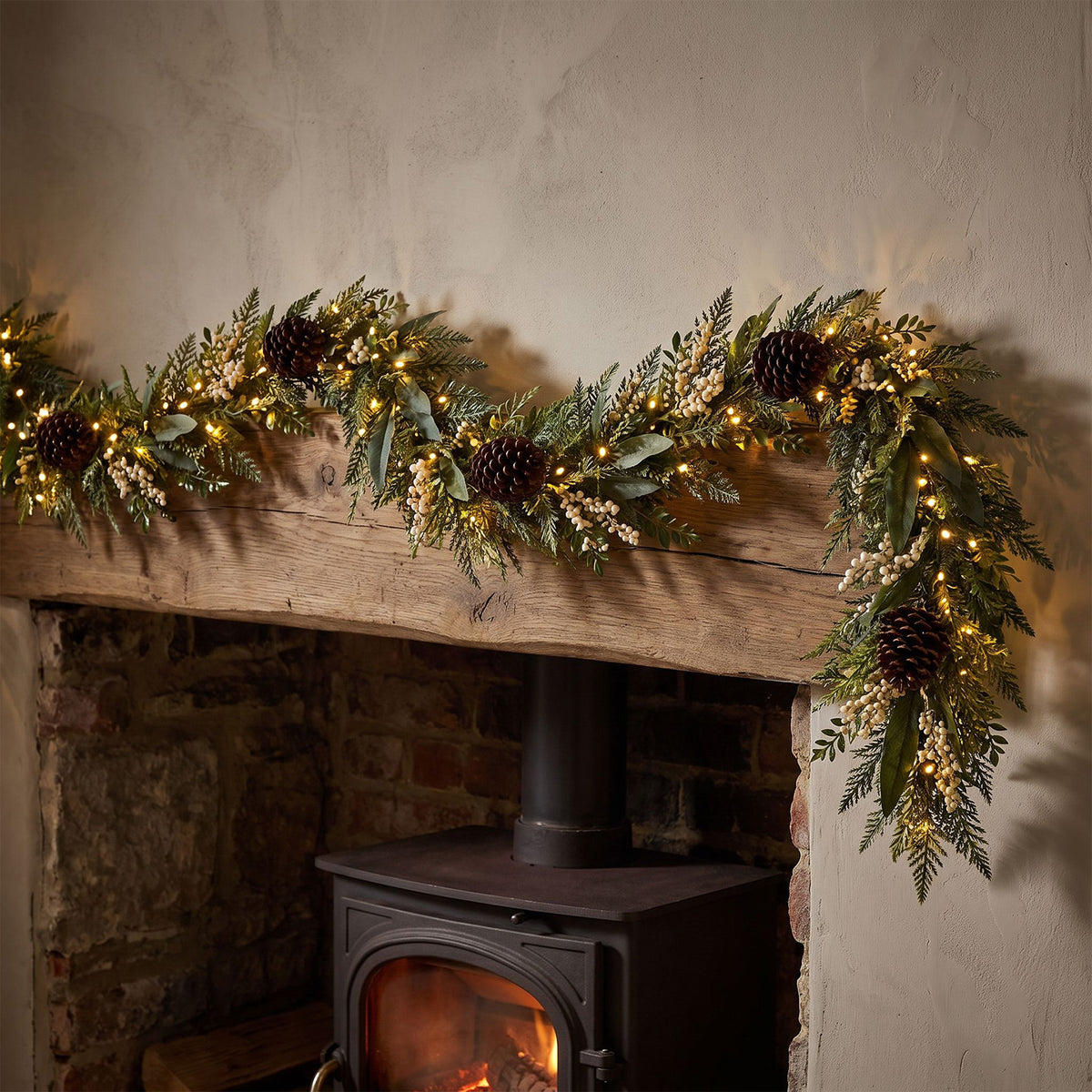 The Christmas Centre Winter Glow 9ft (270cm) Prelit Christmas Garland with Warm White Battery Operated LED Lights