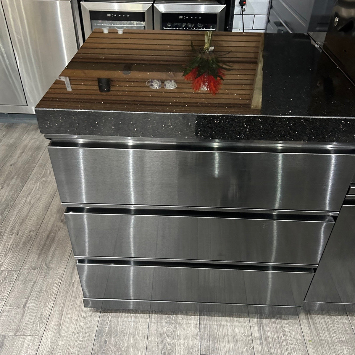 Ex Display Draco Grills 4 Burner Black Stainless Steel Outdoor Kitchen with Sear Station, 3 Drawer Unit and Mid Height Unit with Single Fridge