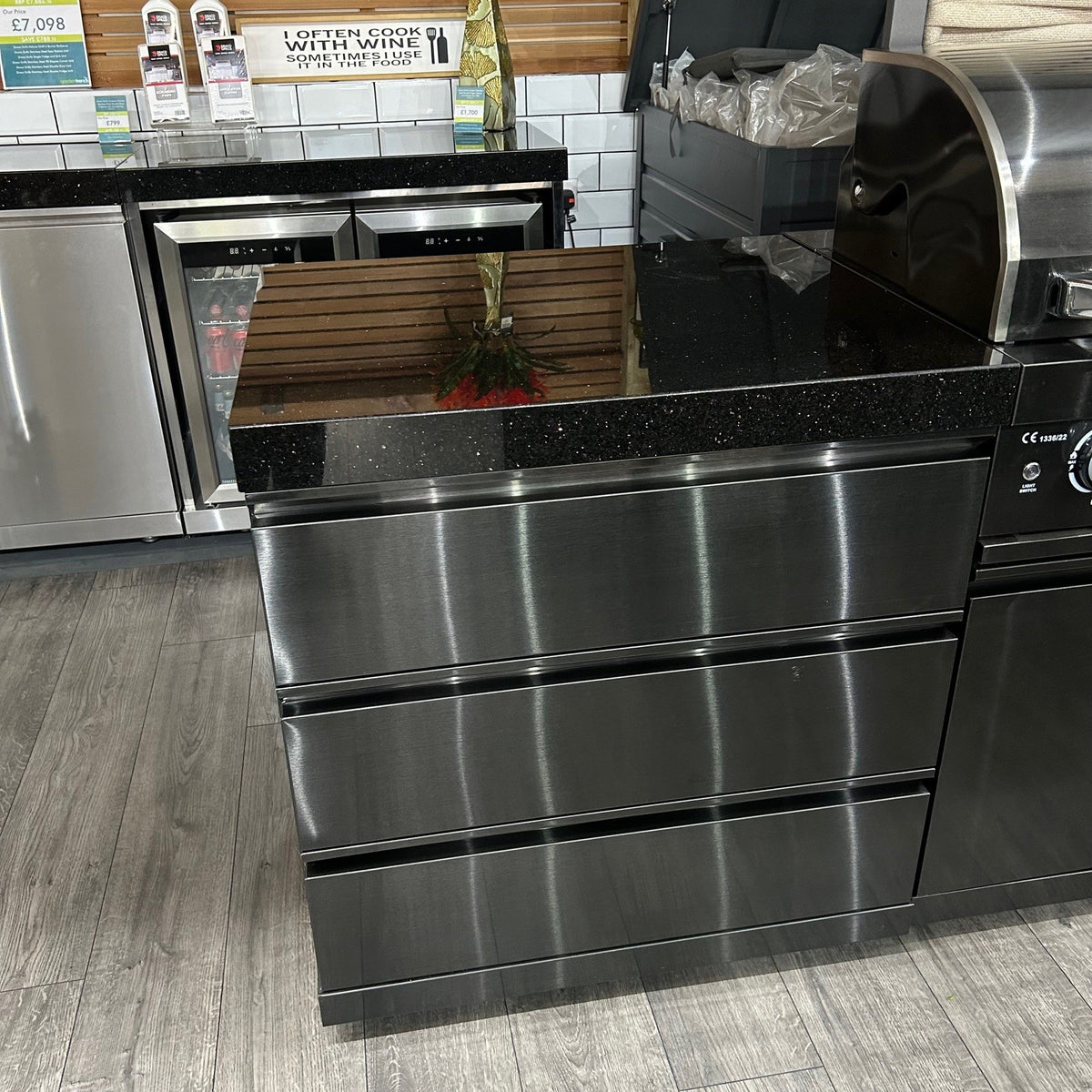 Ex Display Draco Grills 4 Burner Black Stainless Steel Outdoor Kitchen with Sear Station, 3 Drawer Unit and Mid Height Unit with Single Fridge