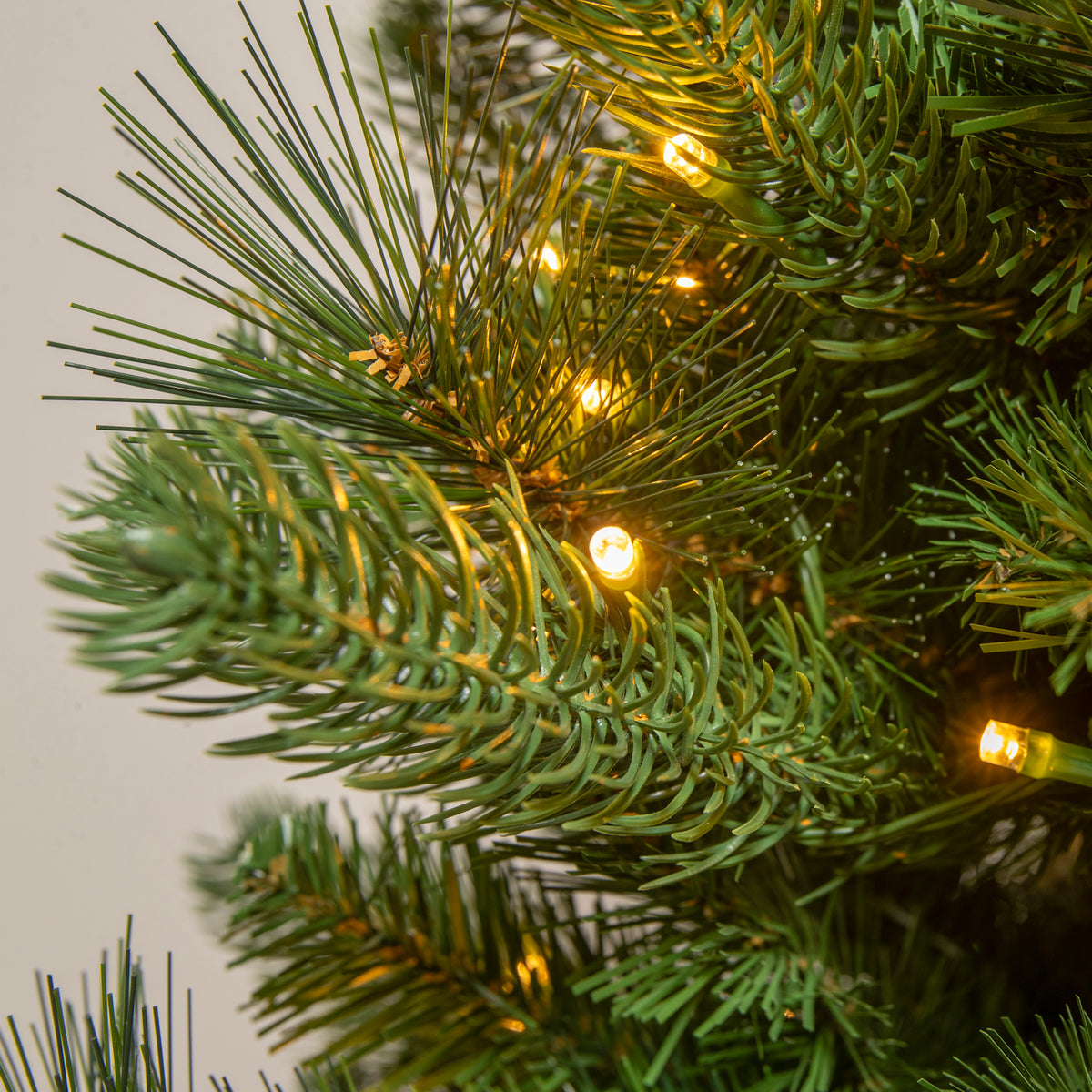 Stirling Pre-Lit PVC Potted Artificial Christmas Tree 4FT