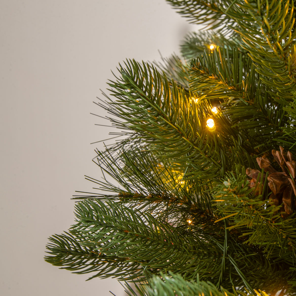 Stirling Pre-Lit PVC Potted Artificial Christmas Tree 4FT