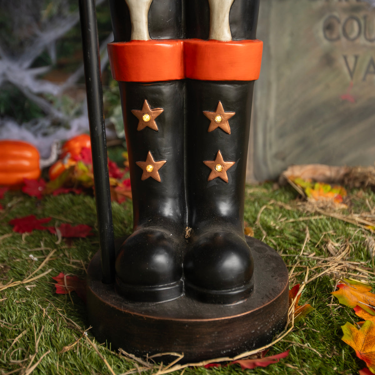 4ft Halloween Skeleton Nutcracker Orange and Black with Skull Staff and LED Lights
