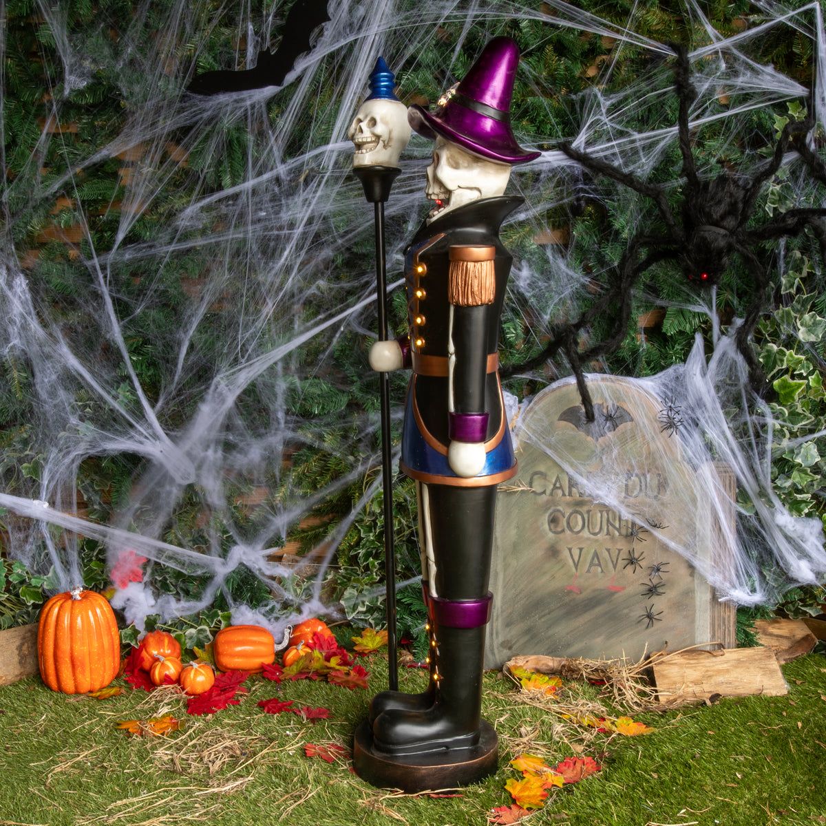 4ft Blue and Purple Halloween Nutcracker Skeleton with Skull Staff and LED Lights