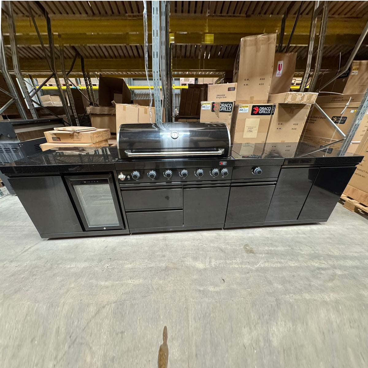 Ex Display Draco Grills 6 Burner BBQ Black Stainless Steel Modular Outdoor Kitchen with Sear Station, Double Cupboard and Fridge Unit