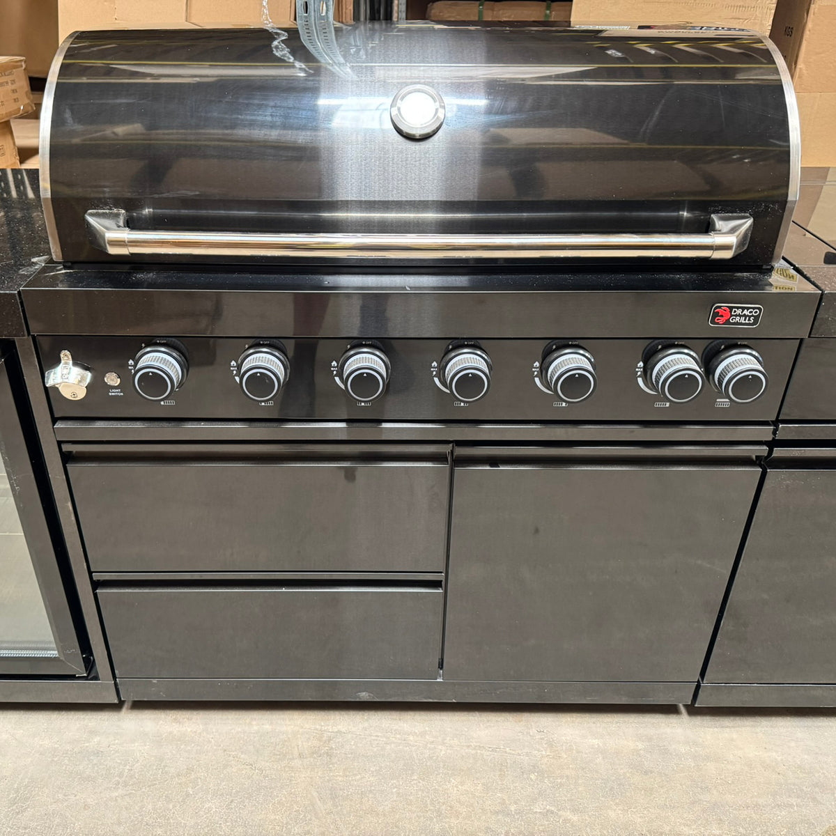 Ex Display Draco Grills 6 Burner BBQ Black Stainless Steel Modular Outdoor Kitchen with Sear Station, Double Cupboard and Fridge Unit