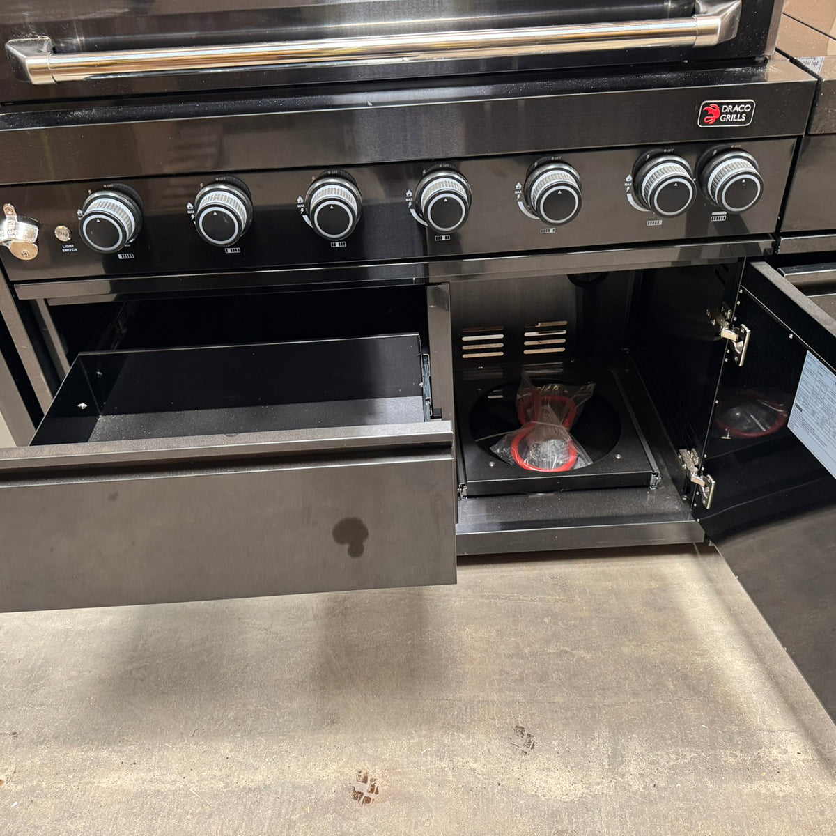 Ex Display Draco Grills 6 Burner BBQ Black Stainless Steel Modular Outdoor Kitchen with Sear Station, Double Cupboard and Fridge Unit