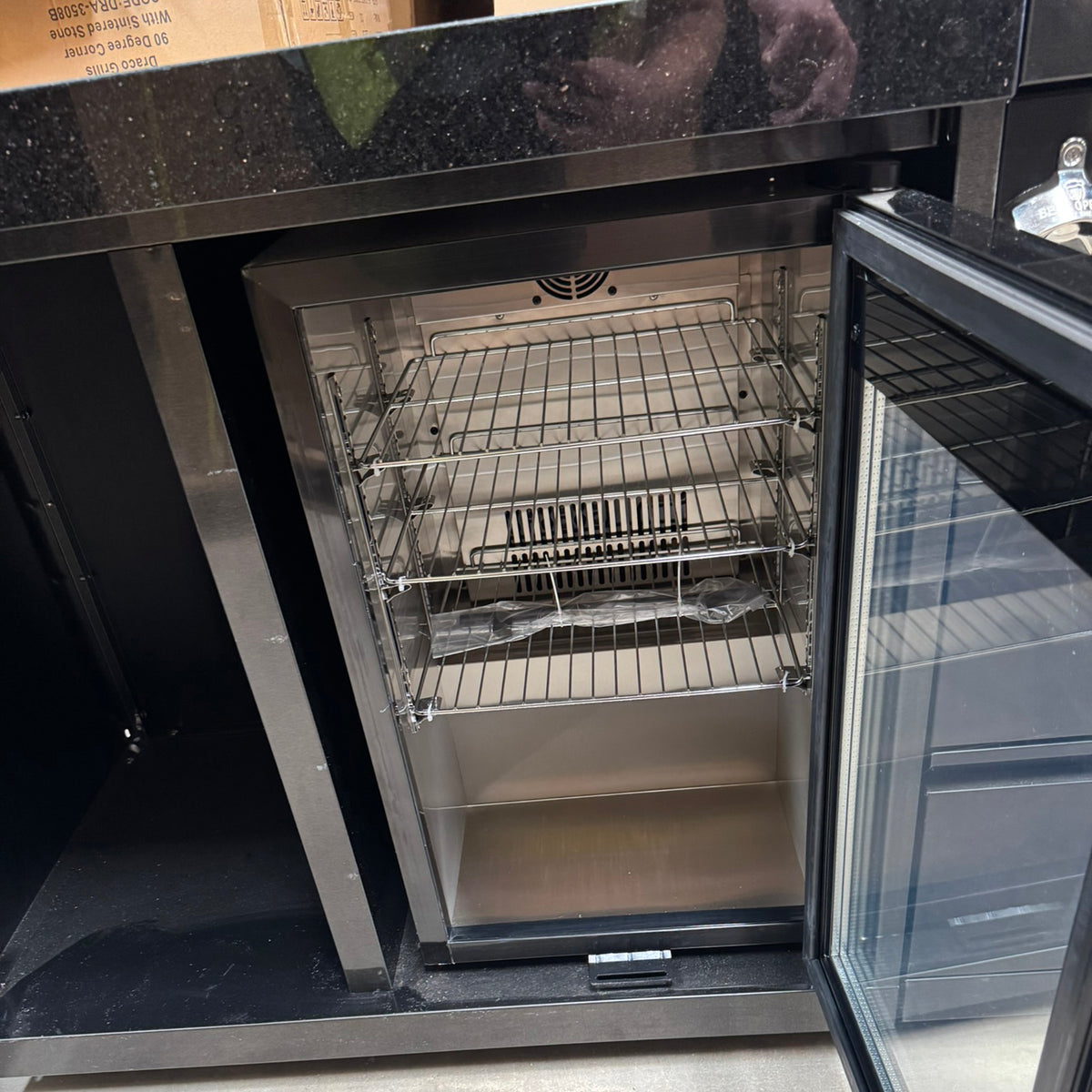 Ex Display Draco Grills 6 Burner BBQ Black Stainless Steel Modular Outdoor Kitchen with Sear Station, Double Cupboard and Fridge Unit