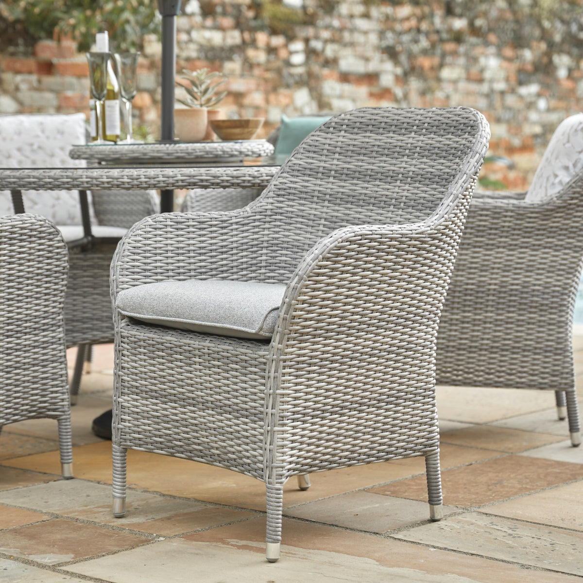 LG Outdoor Monte Carlo Stone Rattan Weave 6 Seat Garden Furniture Dining Set with Lazy Susan