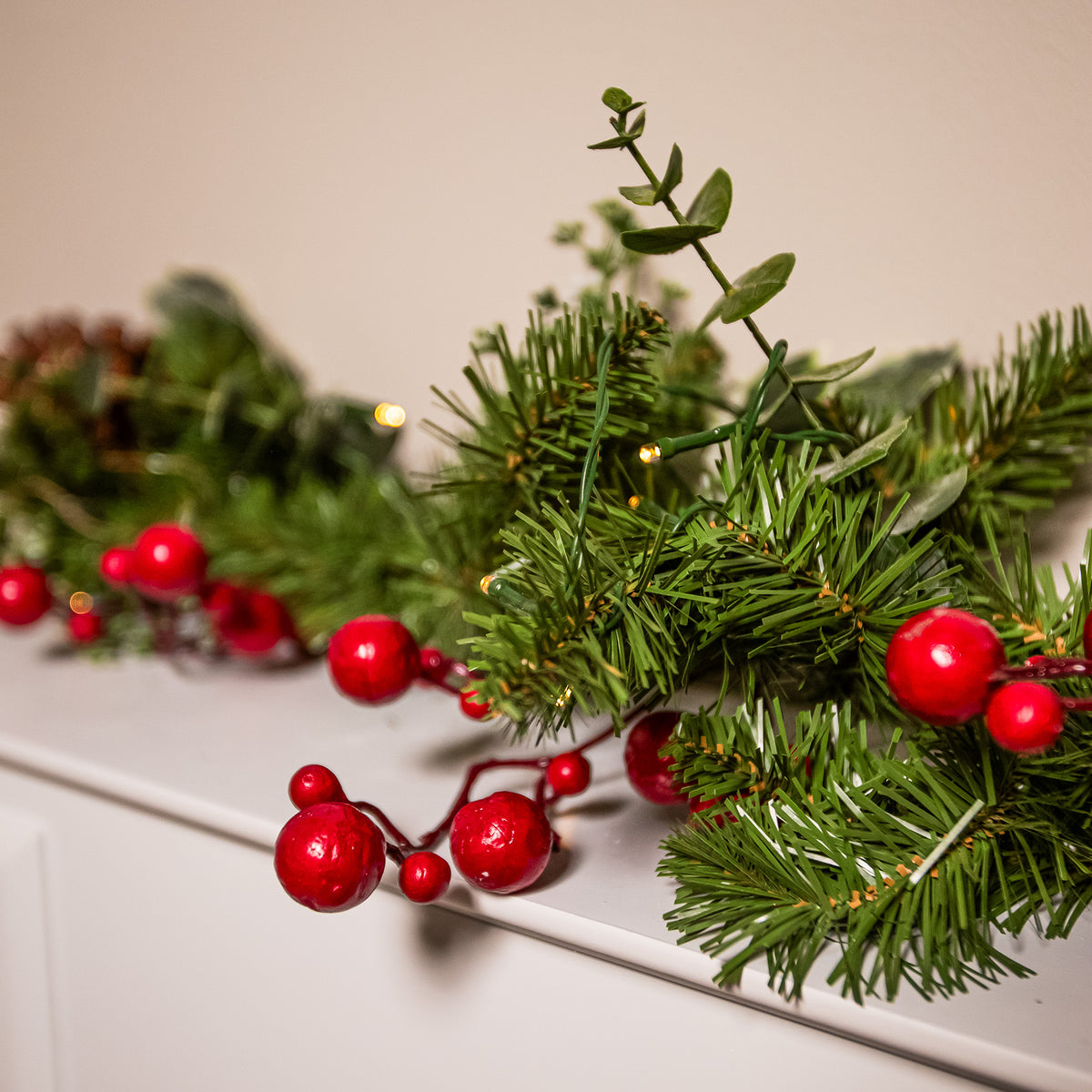 The Christmas Centre Hollyberry 6ft (180cm) Prelit Christmas Garland with Warm White Battery Operated LED Lights