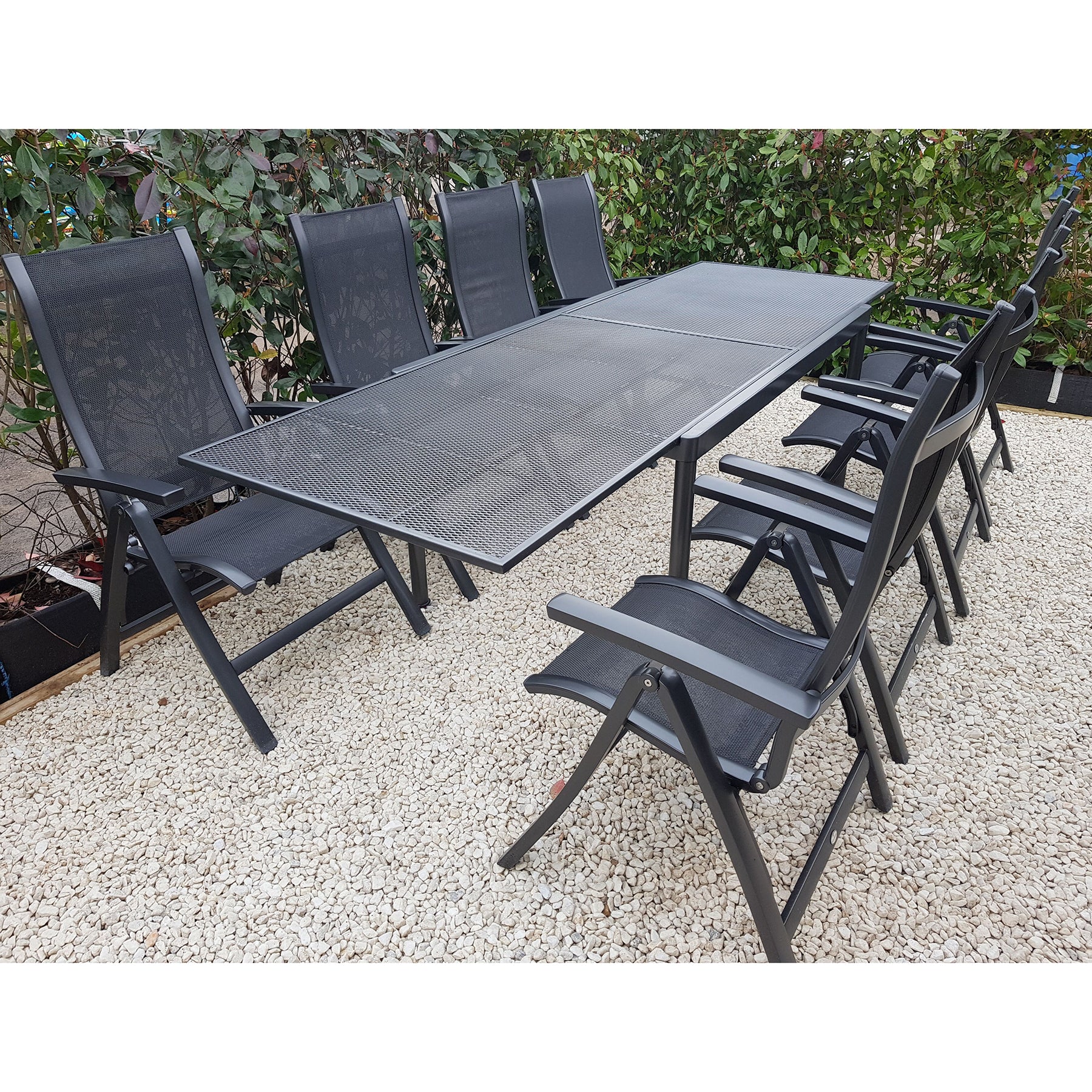 outdoor table with reclining chairs